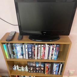 TV with built in DVD about 14” screen, load of dvds and some cassettes aswell in a bookcase