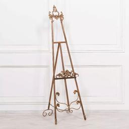Antiqued French Style Metal Easel - 165cm - Beautiful & bold, Antique Stunning Gold Easel to HIRE out. This can be hired with a specialised acrylic board to match the easel. Any message can be written with a choice of your font and colour and any event from a birthday party to a wedding to a baby/bridal shower.

Dimensions of easel - H165 X W52 X D45 C
Weight - 5kg

DM for more details 📝