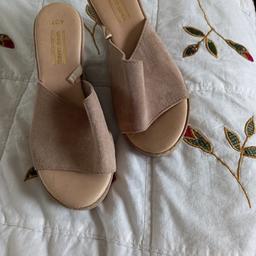 Size 4 Beige/ Fawn platforms. Worn once Excellent condition.