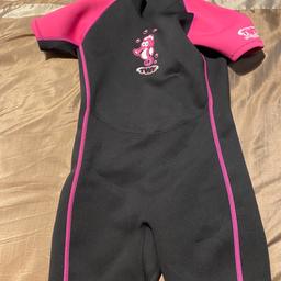TWF Seahorse Girls Wetsuit. Used but only a handful of times (if that!). UPF 50+. High density neoprene for maximum wear. Flatlocked stitching. Zip with plastic slider & velcro ziplock. For beach & sea use. 2mm neoprene. Pet & smoke free home. Collection only. REDUCED 