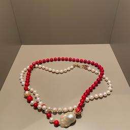 This handmade necklace is made of freshwater pearls with bamboo coral with baroque Pearl and Japan golden plated brass findings. It can be worn as single long necklace or double wrapped matching any outfits. Pair with Farra earrings and bracelet to create your own style. Also, this is a timeless and unique gift for birthday, anniversaries or festivals.

Size: Approx 40" ( Adjustable )

It will be contained in nice jewelry box with well packed.

Never been worn!

RRP- 185£