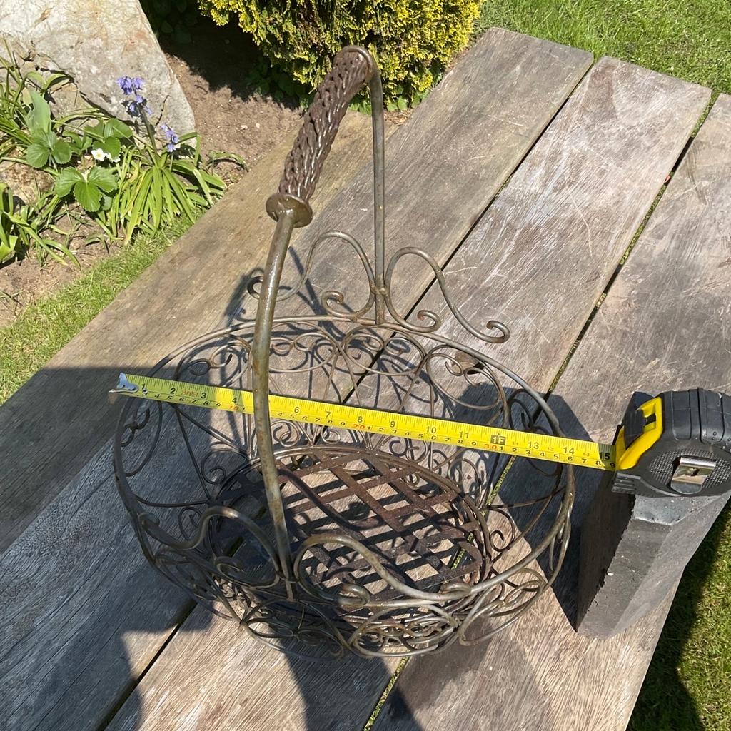 A useful wrought iron basket for floral displays inside or out.
Well constructed