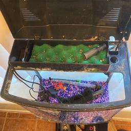 Fish tank with built in filter also coloured gravel 
Grab yourself a bargain gravel alone was expensive , Granddaughter only selling as she as a bigger tank  now
