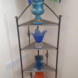 One of a kind wrought-iron corner unit. Designed and made by my father. Collection is s35 or can deliver within a reasonable distance.