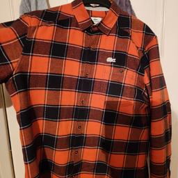 shirt LACOSTE original.
SIZE M. Full sleeves. 

FREEE but don't take it to sell on.. quite warm.. not thin...
enjoy it as much as i had. good condition. I would keep but doesn't fit anymore. .ENJOY