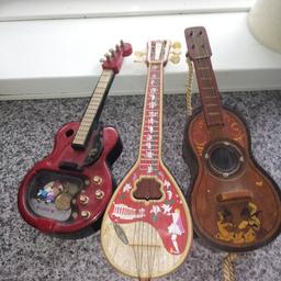 3 Wind Up Musical minture Ornamental instruments. 1 Acustic Guitar 1 Electric Guitar and 1 Mandolin. Collection Only from WV12QE
£3each or all 3 for £7.5