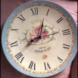 Vintage style wall clock. Lovely large wall clock with vintage style and feel. French blue trim and pretty logo to the front of large clear face . Needs a battery . Great item .