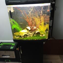 90 Ltr fishtank can keep fresh water or marine. built in wier and filtration at the back led lights ect pump filters and heater on black unit., built in fans and lights in lid..
collection only
