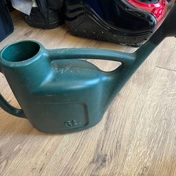 In good condition watering can hardly used it
