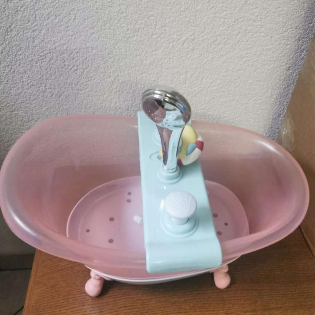 Verkaufe nie benutzte Badewanne von Baby Born mit Licht und Sound.