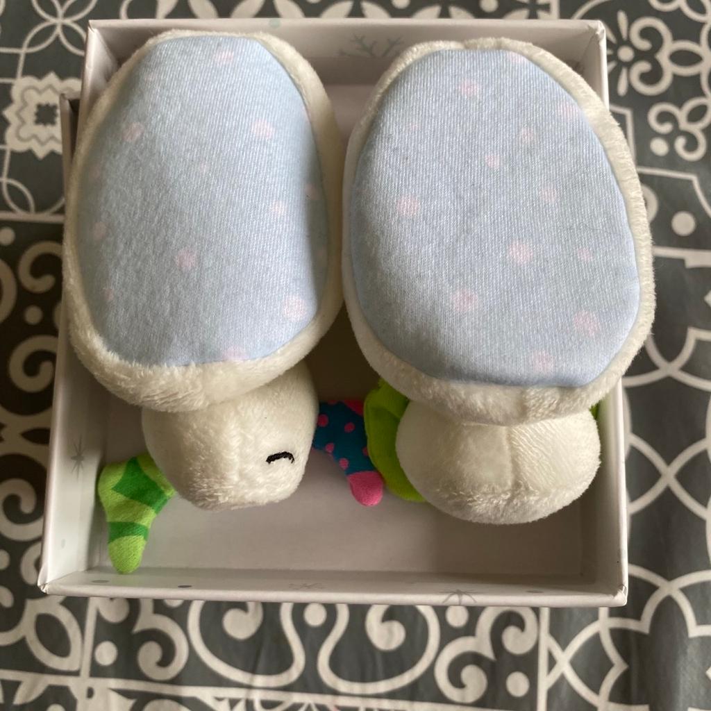 Baby’s First Christmas Jingle Bell Booties - The Snowman and The Snow Dog.
