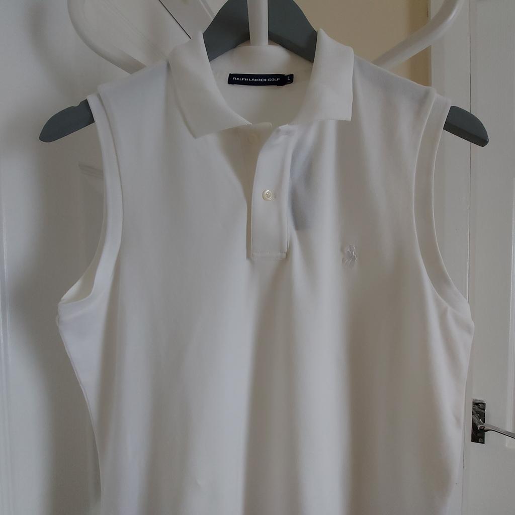 Shirt “Ralph Lauren“ Golf

 White Colour

New With Tags

Polo Ralph Lauren Europe Sarl.

 Refined Stretch Mesh Classic Oxford White.

Actual size: cm

Length: 62 cm

Length: 43 cm from armpit side

Shoulder width: 36 cm

Hand volume: 41 cm

Bust volume: 95 cm – 96 cm

Waist volume: 91 cm – 92 cm

Hips volume: 95 cm – 96 cm

Size: L

97 % Cotton
 3 % Elastane

Made in Thailand

Price £ 55.90