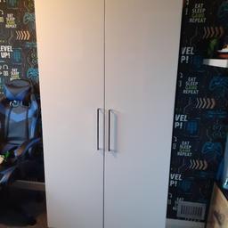 £60 IF COLLECTED THIS BANK HOLIDAY WEEKEND, IF NOT STILL £70. Atomia free standing gloss and matt white 2 door large double wardrobe, shelf, in excellent clean condition, very solid, H 1929mm, W1000, D 596mm, smoke free home, cash on collection only. Will help to dismantle if need to, I also have the instructions booklet. Please note I cannot deliver. NO OFFERS