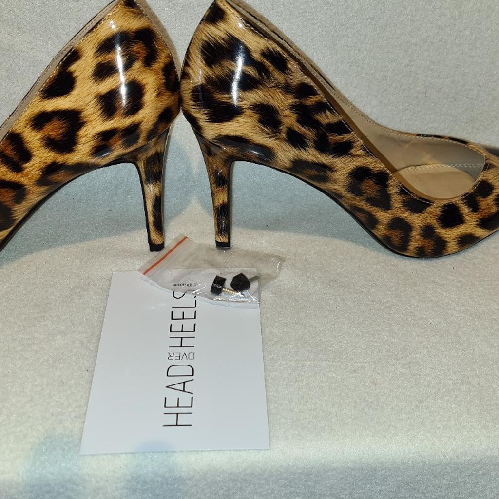 Dune Head Over Heels Leopard Print Patent Heeled Shoes BNWB. Uk 6. Stunning. See photos for condition, flaws, size and materials. I can offer try before you buy option if you are local but if⁸ viewing on an auction site viewing STRICTLY prior to end of auction.  If you bid and win it's yours. Cash on collection or post at extra cost which is £4.55 Royal Mail 2nd class. I can offer free local delivery within five miles of my postcode which is LS104NF. Listed on five other sites so it may end abruptly. Don't be disappointed. Any questions please ask and I will answer asap.