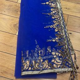 Ladies/girls dupta has  embroidered and beads  blue and gold . Excellent condition. £3. Can b used with any plain suit .