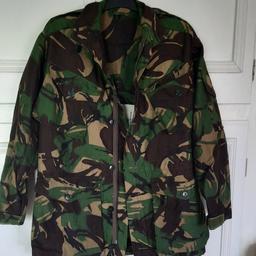 camouflage army jacket 
size medium to large 
been worn for sea cadets 
in good condition. but the zip is a bit stiff to close