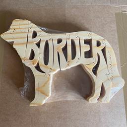 Brand new animal puzzle in the shape of a dog.
Border collie