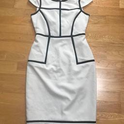 REF 7

VERSATILE DRESS THAT CAN BE WORN DRESSED UP OR DOWN
SLIGHTLY CREASED FROM STORAGE 
100% POLYESTER 

ADVERTISED ON OTHER SELLING SITES. CASH ONLY, NO RETURNS, NO REFUNDS OR COURIER COLLECTIONS & DELIVERY IS NOT POSSIBLE UNLESS BUYER PAYS POSTAGE. NO RESERVE (HOLDING) - FIRST TO COLLECT ASAP!!