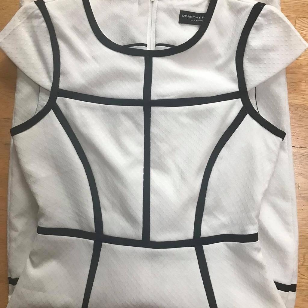REF 7

VERSATILE DRESS THAT CAN BE WORN DRESSED UP OR DOWN
SLIGHTLY CREASED FROM STORAGE
100% POLYESTER

ADVERTISED ON OTHER SELLING SITES. CASH ONLY, NO RETURNS, NO REFUNDS OR COURIER COLLECTIONS & DELIVERY IS NOT POSSIBLE UNLESS BUYER PAYS POSTAGE. NO RESERVE (HOLDING) - FIRST TO COLLECT ASAP!!