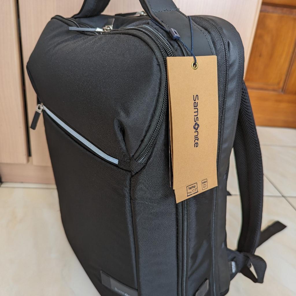 Dedicated padded slot for 17.3in laptop
Lots of compartments
Expands and opens flat
Luggage strap
Bottle pouch