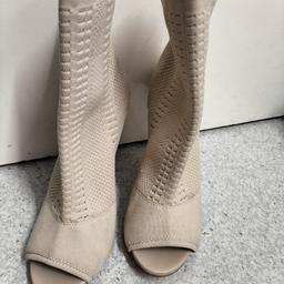 New Look !
High Heal Stiletto High Ankle Boots
Knit Stretch Peep Toe Shoes Booties
Beautiful Design 😉

Size 5