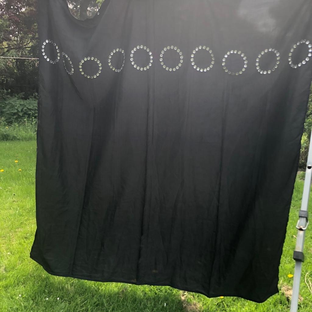 Dunelm shower curtain . Black with decorative jewel rings to outside . Was £15 . Lovely item .