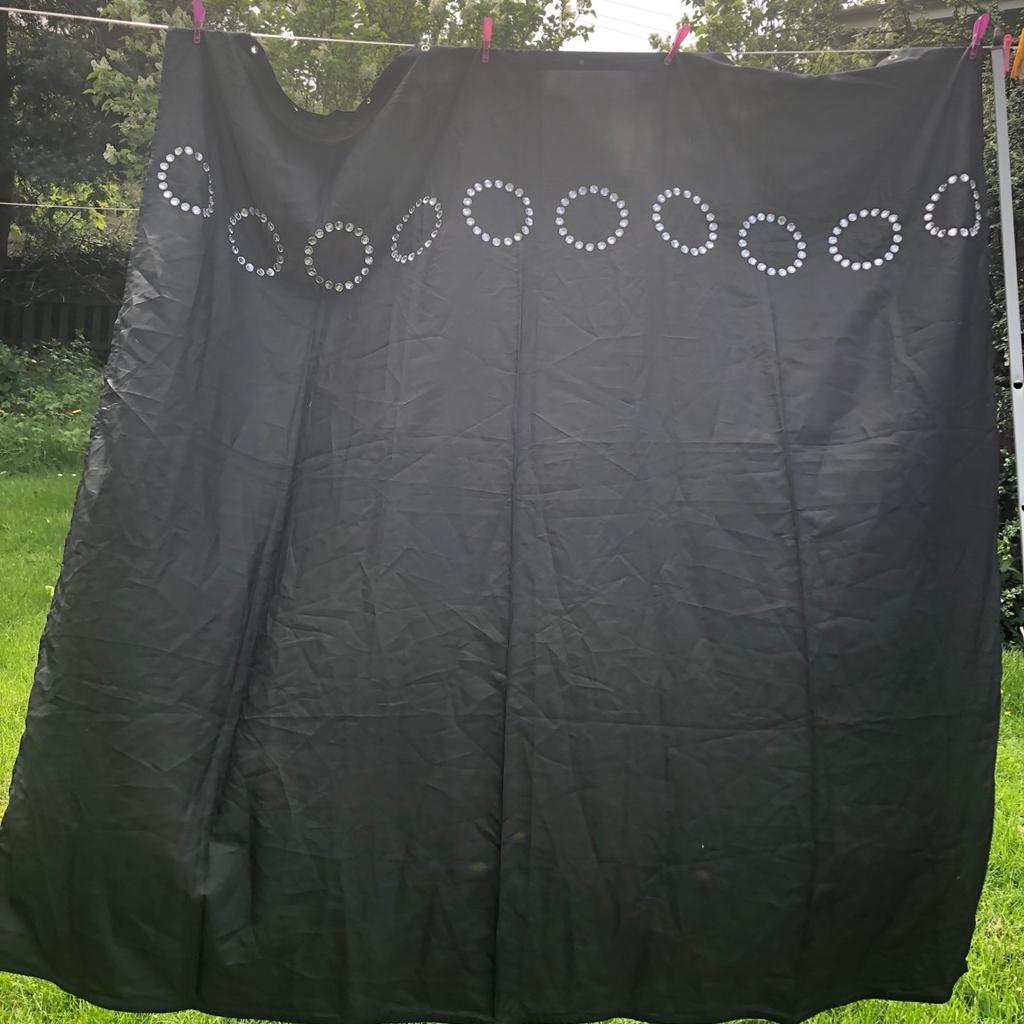 Dunelm shower curtain . Black with decorative jewel rings to outside . Was £15 . Lovely item .