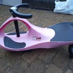 A nice and good working order toddlers ride on 3 wheeled scooter with steering wheel. 07786--012316