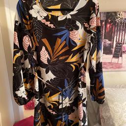 Lovely tunic style dress, lightweight material. In excellent condition only worn once.