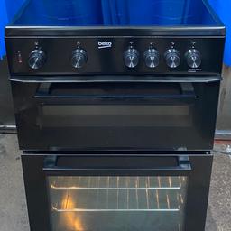 Hello welcome to my ad,This Beko KT￼C611K 60cm double oven Electric ceramic cooker comes in a black colour with four ceramic hob,hot hob indicator, double glazed doors and viewing windows, removable inner door glass for easy cleaning, interior light,catalytic liners in both ovens making cleaning easy,defrost option,three shelves,easy clean enamel,main oven is electric fanned assisted with a cooking capacity of 75 litres usable while second oven (Top) is integrated variable electric grill with 31 litres capacity very clean and tidy dimensions are H:900 W:600 D:600 cash on collection at B18 7QD 71 western road or delivery for extra fee, for more information message me please check my others cookers as I got lots in stock thanks also all our cookers comes with three months warranty.