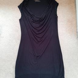 Dorothy perkins black dress with stud detail around neckline and arm holes, size 12