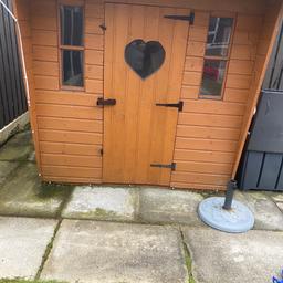 Wooden Wendy house heavy duty with glazed pvc windows and one to the side as seen in picture , 6ft x 5ft , original price paid was £500 buyer collects it as been dismantled.