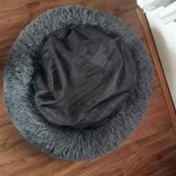 Dogs grey fluffy bed