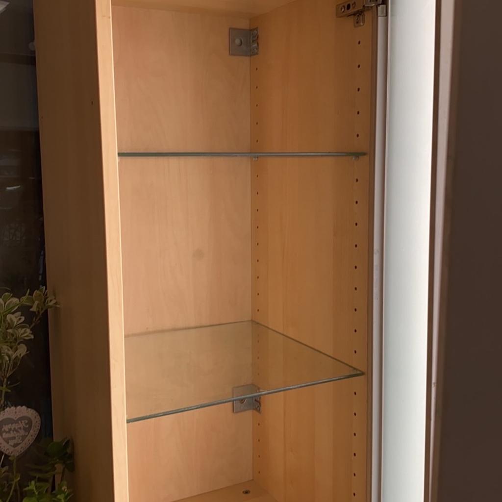 Ikea Storage cabinet.
Glass door.
2 glass shelves.
Lots of storage space.
Can be used in any part of your house