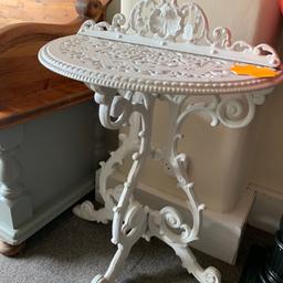 Cast iron half moon table very heavy in a good used condition can deliver locally for price of fuel