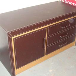 Brown leather covered solid oak sideboard
3 x draws and 2 shelf cabinet

136cm wide 73cm tall 63cm depth

Would need two person collection as it’s heavy