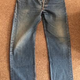 Man’s original Levi Strauss denim stonewashed 501 jeans with button flies. Size 36 inch waist and 32 inch length. Good clean condition no holes from non-smoking and no pet home.