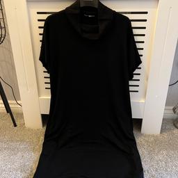Warehouse black jumper dress with capped sleeves. Worn once only.
Immaculate condition.
Size 6 but will also fit size 8.
Has pockets on both sides.
Smoke and pet free home.