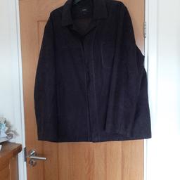 Fully lined jacket with 2 front pockets, 1 breast pocket and 2 inside pockets one of which buttons down for security.
Can't see a label regarding the fabric, it could be brushed cotton, it has the appearance of faux suede. Hardly worn.