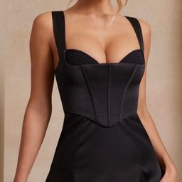 Oh Polly A Line Corset Mini Dress Black BNWT Size S

A must have style for creating a romantic look this party season, Delphine has everything you need to stand out from the crowd. Designed in our premium matte satin fabric, Delphine features a low, angled neckline that exposes the underwired cups that complete the flattering built in corset. Designed to create a fun and flirty silhouette, Delphine is complete with a curve skimming a line skirt with delicate pleat detailing. Perfect for creating the ultimate festive party look, we know you’ll be loving Delphine this season.

Angled neckline with exposed cups

Adjustable shoulder straps

Hidden zipper on reverse

Built in corsetry (boning, hook and eye and zipper)

Angled corset hem

A-line skirt with pleat detailing

Bodycon bodice for a flattering fit

Mini length

Please note: colour may vary due to lighting