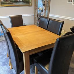 for sale solid wood extendable table and six chairs VGC. four foot four inches x three foot and six foot six inches x three foot expanded. buyer must collect. £140 ono
