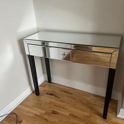 New never used 
Mirrored console table from tk Maxx 
Large drawer 
Black legs 
Paid over £200 but isn’t needed now