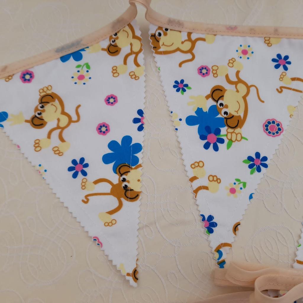 10 foot long material bunting. Made from polycotton material. Backs of flags are plain in colour. Edges are cut with pinking shears. Hand made. Combined postage available for multiple purchases.