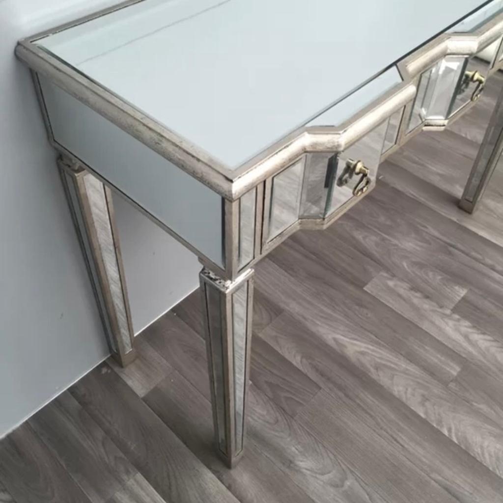 This mirrored console table adds instant glamour into any home. Arrange candles or a pair of statement lamps on top to create an ambient glow.

Table is in immaculate condition in a pet free home.

Measurements
Height: 80cm
Width: 112cm
Depth: 45cm

Collection only
Payment on collection

Any questions please feel free to reach out.