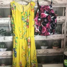 THIS IS FOR A SMALL BUNDLE OF LADIES CLOTHES

1 X ROSE THEMED VEST STYLE TOP FROM MISS SELFRIDGES
1 X YELLOW DRESS WITH FLORAL DESIGN FROM ATMOSPHERE

HAVING A CLEAR OUT

PLEASE SEE PHOTO