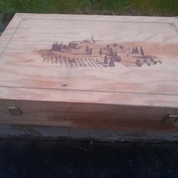 A nice decorated vintage wooden cigar box ideal for crafts making storage. Measures 21 inches long by 13 inches wide by 4 inches deep. 07786--012316 Louise