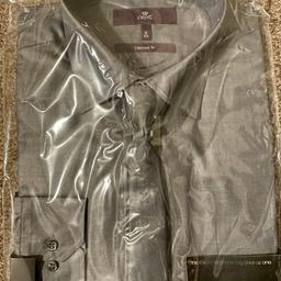 Brand new men’s Next Tailored Fit long sleeve shirt size 16 still in original packaging with tie. 100% cotton.