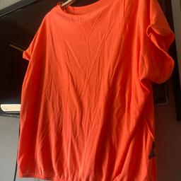 Ladies summer
Top
Orange colour 
Size large