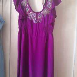 New newlook dress size14 from tall range length is.39ins has.elasticated.detail and bead.an.sequinn details at front