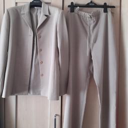 New next suit jacket fully lined size10 .trousers have a side zip elasticated at front with a tie looks fab.on for any.occasion trousers are a size12
